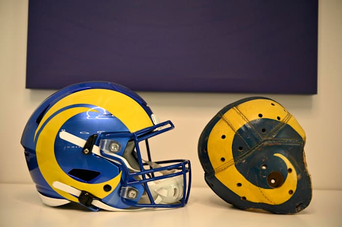 A modern Rams helmet next to the possible first prototype